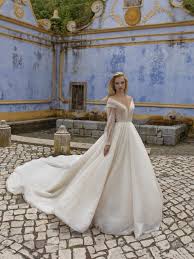Finding the right wedding dress silhouette is a matter of understanding your body type. Spell Ana Koi Bridal