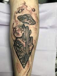 Grey ink alien tattoo on man back body. Pin On Jordyn Grine Tattoo In Columbus Ohio