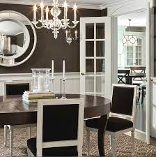 On the sideboard the browns usually have a bowl of fruit: Dining Rooms And Foyers The Art Of The Table South Shore Decorating Blog Brown Dining Room Dining Room Wainscoting White Wainscoting