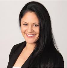 What travel agent has experience booking trips to Santorini?