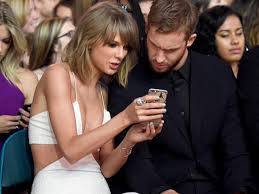 Taylor swift and calvin harris lounging on a swan float. Taylor Swift Calvin Harris Highest Paid Celeb Couple