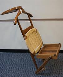 The seat is hinged and can be placed in an upright position so the trousers can be neatly folded. Lot Mid Century Modern Mahogany And Rope Seat Valet Chair