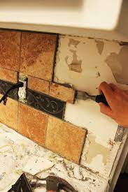 Always wear safety glasses when removing ceramic tile. How To Remove Kitchen Tile Backsplash