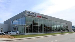 The company's unified design standard is helping dealerships embody the style of audi vehicles, resulting in buildings that are as identifiable as the cars they hold inside. Audi Denver Usa Certified Pre Owned Showroom Now Open