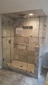 Frameless Shower Door With Chrome Hardware Towel Bar Handle Combination And A Mitered Return Panel Framel Frameless Shower Doors Shower Doors Glass Shower