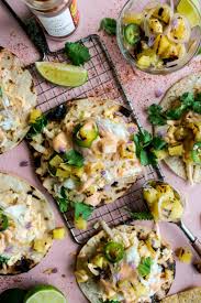 They'll make the perfect weekend night out by the grill surrounded by family or friends. Grilled Fish Tacos With Pineapple Salsa Chile Mayo The Original Dish Grilled Fish Tacos Grilled Fish Recipes Pineapple Salsa