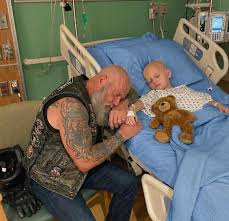 The boy asked me to hold his hand while he died because his dad wouldn't.  I'm a sixty-three-year-old biker covered in tattoos with a beard down to my  chest. I've buried war