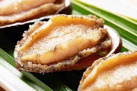 Like other univalve snails, it has a single shell on top and uses a large foot to cling to rocks and eat algae. What Is Abalone And Is It Good For You Nutrition Advance