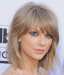10 Hairstyles To Try When You Re Growing Out Your Bangs Ash Blonde Hair Colour Medium Hair Styles Short Hairstyles For Thick Hair