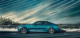 Profile Shot Of The 2019 Bmw 4 Series Coupe Parked On A Suspension Bridge Bmw 4 Series Bmw 4 Bmw 4 Series Coupe