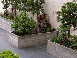 Concrete decorative planters for indoors and outdoors, ranging in sizes suitable for air plants all concrete planters are especially well suited to industrial, modern, and minimalist interior gardens. Board Formed Concrete Planters Concrete Planters Board Formed Concrete Garden Wall