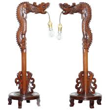 Pair Of Chinese Mahogany Dragon 1920s Hand Carved Wood Table Lamps Part Of Set At 1stdibs Ancient chinese dragons are ultimate symbols of cosmic chi (energy).