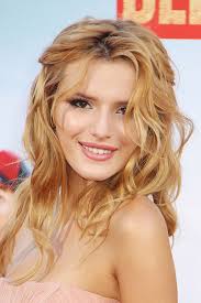 But even creators have to live on. Bella Thorne Curly Ginger Half Up Half Down Overgrown Bangs Hairstyle Steal Her Style