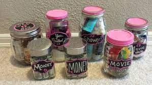 Cups, bags, bows and plastic filling from the dollar tree plus $5 starbucks gift cards. For Arabella S Baby Shower Coed Prizes For Baby Shower Games Gift In A Jar Do It Yourself Made Baby Shower Game Prizes Coed Baby Shower Baby Shower Prizes