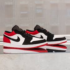 Red Black White Jordan 1 Low Black Toe The Black Toe Colorway Arrives On The Jordan 1 Low Are You A Fan Hit The Link In The Bio To See The Rest Of The Thr Black Toe Shoes Sneakers