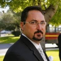 Chris Holguin Email & Phone Number