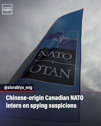 A Canadian citizen of Chinese origin suspected of carrying out “espionage  on behalf of a third country” while on an internship at NATO has been  arrested in Belgium, authorities say.