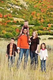 Brown Orange Pink Fall Family Photo Outfits Family Photoshoot Outfits Fall Family Portraits