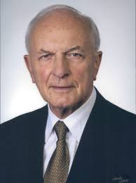 The Honourable Robert Wells, QC.