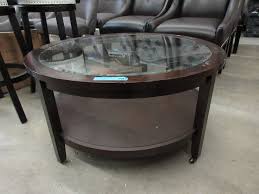 What is an industrial coffee table: Glass Top Round Coffee Table On Casters