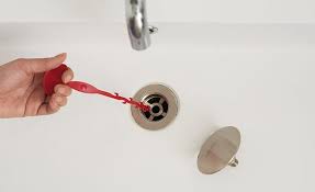 clear a clogged drain drano