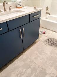 Paint you walls a neutral color such as beige and have dark wood bathroom cabinets with hard edged metal fixtures that can create the look of modern home design. Our Guest Bathroom Remodel Before And After Jane At Home