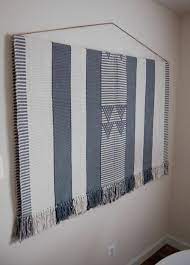 How To Hang A Large Heavy Rug On The Wall Wall Rug Interior Wall Design Blanket On Wall