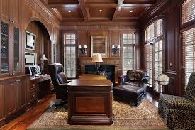 Richly Appointed Home Office And Den With Large Dark Wood Furniture Extensive Wood Paneling W Traditional Home Offices Leather Office Furniture Luxury Office