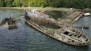 A couple of drone pictures from a boat cemetery in Lorient, France : r/ShipwreckPorn