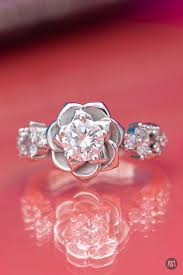 A Beautifully Simple Rose Petal Setting In Platinum With A Round Diamond Center Flower Engagement Ring Unique Engagement Rings Rose Gold Floral Engagement Ring