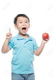 Asian Baby Boy Holding And Eating Red Apple Isolated On White Stock Photo Picture And Royalty Free Image Image 86561544