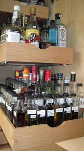 Organizing That Messed Up Liquor Cabinet Page 2 Spirits Cocktails Liquor Cabinet Home Bar Designs Liquor Storage