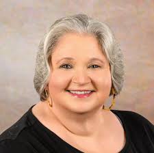 Identifying individuals in a 1973 Camp Mamie Flynn photo