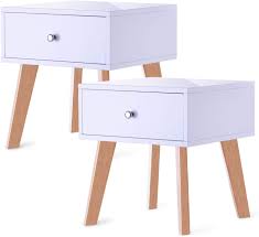 Many of these are durable wooden nightstands but there are many variations. Wooden Bedside Table With White Drawer Heston Collection