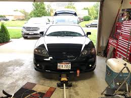 Image result for Ebony Black 2005 Tiburon