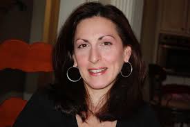 Saint Thomas Aquinas cheerleaders. Includes members of class of 1971 and  others. (Paul Dietterle Jr. Archive Photo)