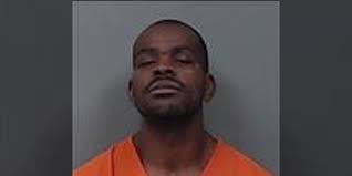 Prosecutors: Robber fired 10 shots at wounded Iowa deputy