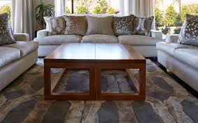 A living room is complete with a beautiful coffee table. Modern Coffee Table In Solid Blackbutt French Tables