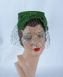 Circa 1960 S Tiny Little Olive Green Pillbox Hat Embellished With A Huge Front Bow Attached Is A Thick Matching Face Hats Vintage Vintage Veils Hijab Vintage