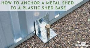 How do you anchor a metal shed to a plastic base?