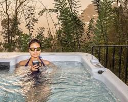 Image of Soaking in a hot bath to relieve muscle pain