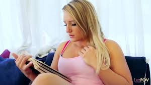 Reading an erotic novel can be very satisfying. A blond girl gets into it  and starts fantasising about having sex with another gorgeous blonde  lesbian. These two blondies lick each other like