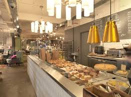 Variety Of Baked Loaves Of Bread On Display In A Bakery Bar Design Restaurant Restaurant Design Awards Bar Design Awards