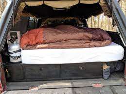 Choosing The Best Suv Or Truck Bed Mattress Memory Foam Vs Air Mattress Vs Sleeping Pad Take The Truck Truck Bed Mattress Truck Camping Truck Bed