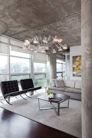 The Iconic Barcelona Chair Featured In Stylish Interior Designs Living Room Loft Loft Design Concrete Interiors