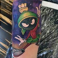 Hi~ my name is roxanne, the chief editor from taiwan tattoo magazine, our team has been working out the topic of cartoon, and visited your photo for information research. 40 Marvin The Martian Tattoo Designs For Men Cartoon Ink Ideas