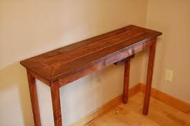 Rearrange wood pallets to dress your home within economical way. Diy Pallet Wood Console Table