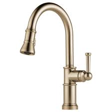 Brizo made this design to bring a warmer look to the industrial aesthetic. Artesso Single Handle Pull Down Kitchen Faucet