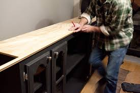 Route edges of diy cabinet doors frame pieces. Keith S Living Room Makeover Kitchen Cabinets Turned Tv Stand The Lettered Cottage