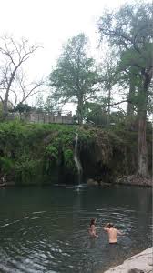 The entry can be slippery. The Waterfall And Swimming Hole Picture Of Krause Springs Spicewood Tripadvisor